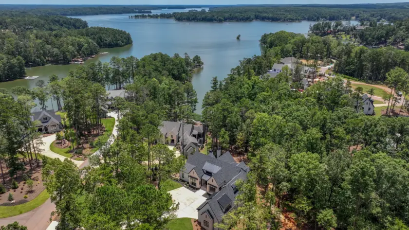 aerial view of houses and lake | Southern Luxury Homes