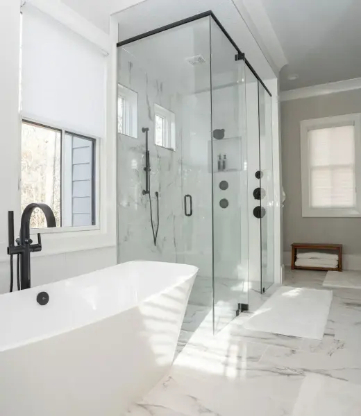 image of modern style bathroom with bathtub and big mirror -custom home builder